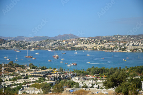 Beautiful marine landscape. Panorama View from the hill to the Gumbet bay in sunny day. Bodrum, Turkey