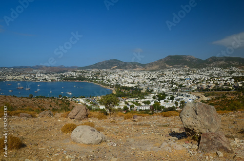 Beautiful marine landscape. Panorama View from the hill to the Gumbet bay in sunny day. Bodrum, Turkey