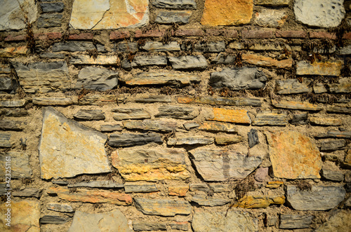 Texture of a stone wall. Old castle stone wall texture background. Stone wall as a background or texture. Part of a stone wall, for background or texture