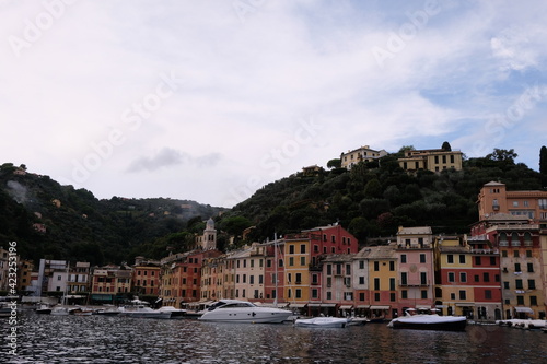 Yachts and Recreationa Boats - Colorful Traditional Houses - Portofino, Italy - Luxury High-End Little Town with a Small Harbour in Italian Riviera photo