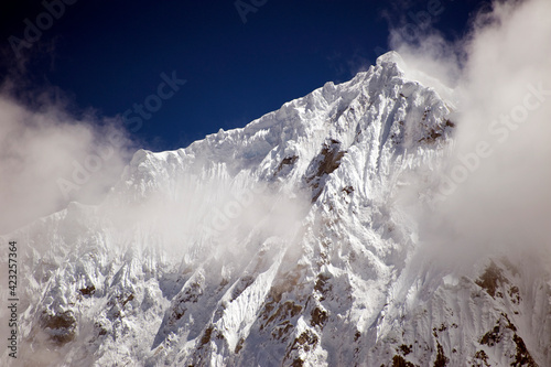 Summit of Quitaraju in the Cordillera Blanca, Peruvian Andes.    photo