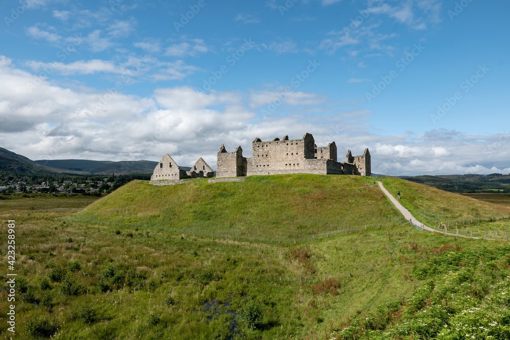 Wide angle landscape with ruins of medieval Ruthven Barracks in Cairngorms National Park near the Kingussie city