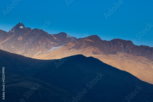 Lesser peaks of Bolivia's Cordillera Real at sunset as seen from La Paz, Bolivia.  