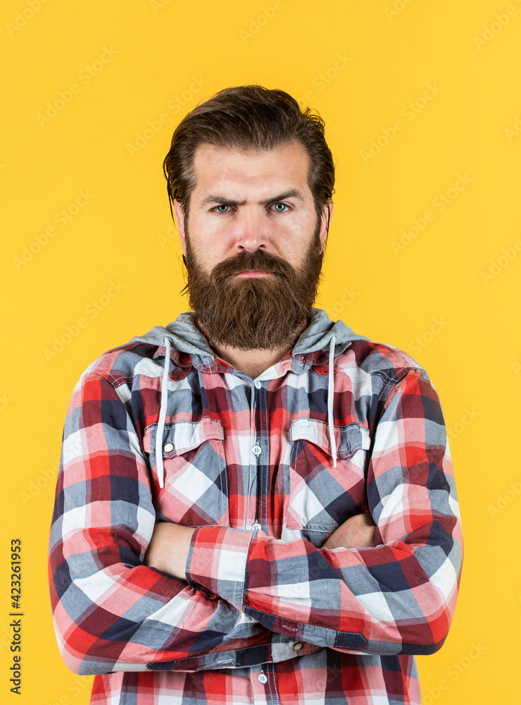 Fototapeta premium mature handsome guy in checkered shirt. stylish male wear casual clothes. bearded man with moustache on unshaven face. fashion and beauty. barbershop concept. mens wear