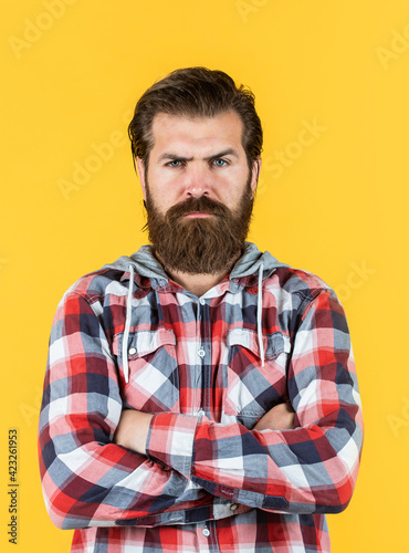 mature handsome guy in checkered shirt. stylish male wear casual clothes. bearded man with moustache on unshaven face. fashion and beauty. barbershop concept. mens wear © be free