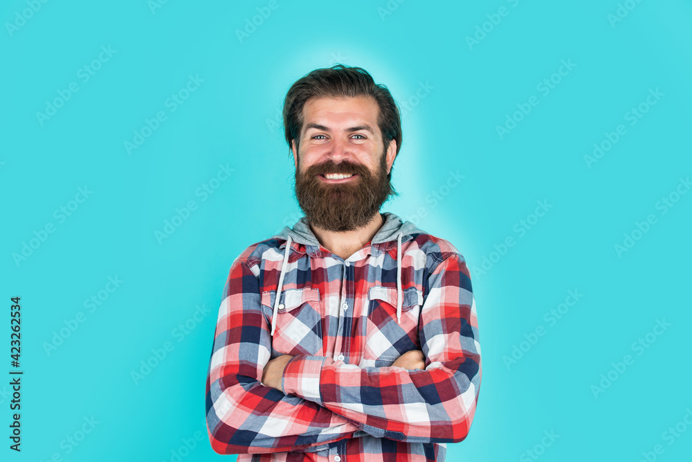 being in good mood. barbershop concept. mens wear. mature handsome guy in checkered shirt. stylish male wear casual clothes. bearded man with moustache on unshaven face. fashion and beauty being in good mood. barbershop concept. mens wear. mature handsome guy in checkered shirt. stylish male wear casual clothes. bearded man with moustache on unshaven face. fashion and beauty