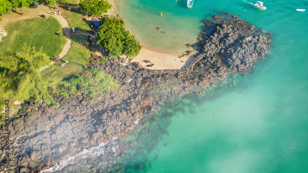 Aerial view of Grand Baie coastline from drone, Mauritius