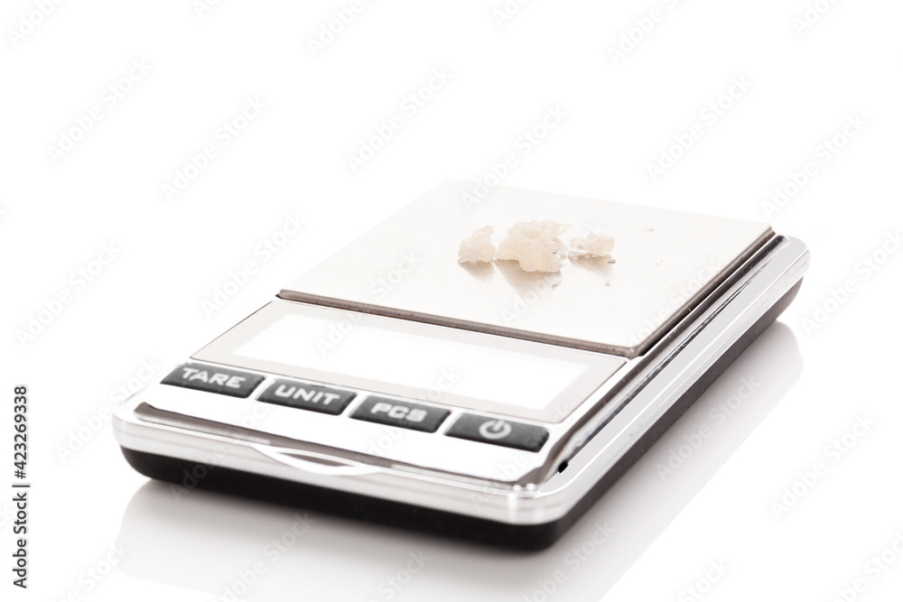 MDMA crystals on digital weight. MDMA crystals on digital weight.