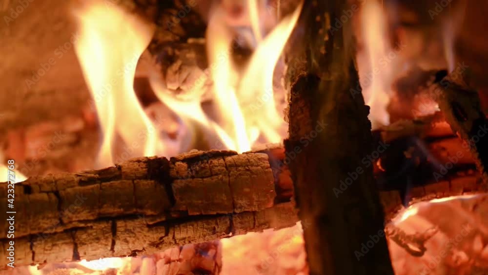 Combustion details, fire wood reduced to hot coals slowly burning and liberating heat. Combustion details, fire wood reduced to hot coals slowly burning and liberating heat.