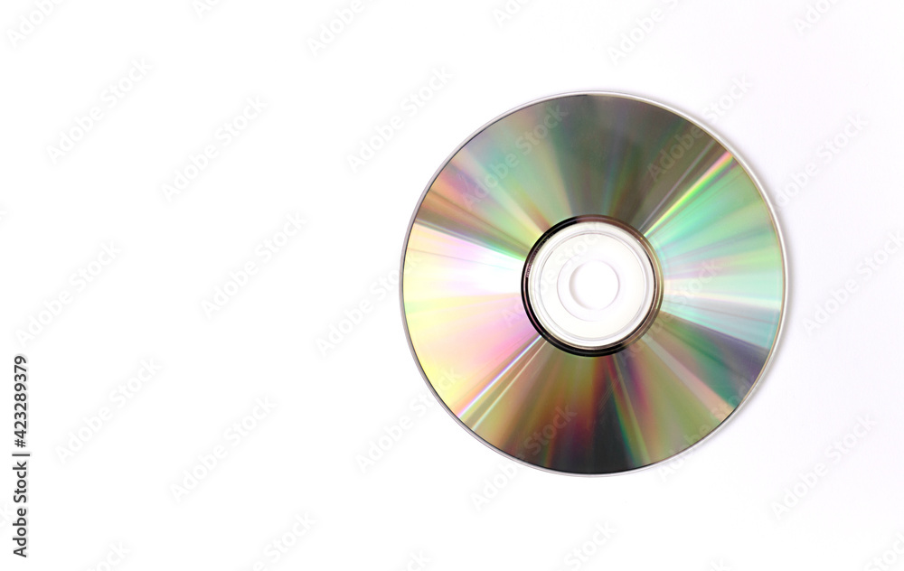 Compact-Disk on white background. CD and DVD background concept. Compact-Disk on white background. CD and DVD background concept.