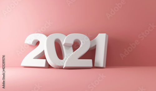 2021 New Year Symbol near the Wall on pink studio background