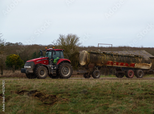 Case IH Magnum 340 tractor towing a 30,000 litre water trailer 