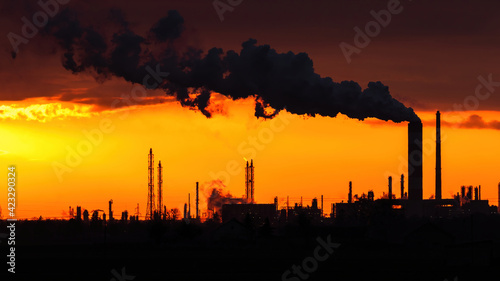 sunset over the refinery and petrochemical plant in the city of Plock