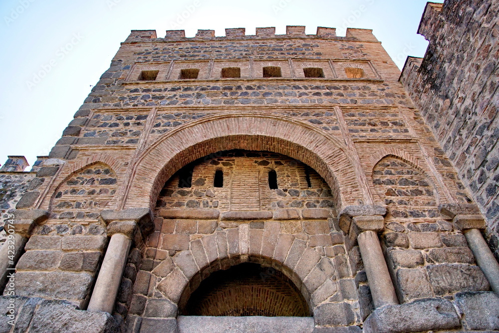 The gate of Alfonso VI in the historic ramparts of Toledo, Spain