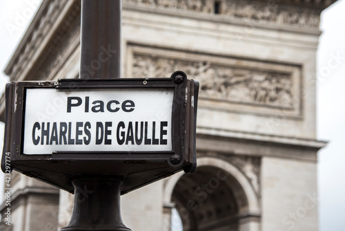 Place Charles de Gaulle street sign in front of the Arc de Triomphe in Paris France. © Ken