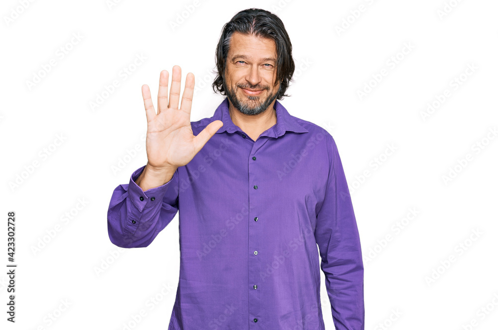 Middle age handsome man wearing business shirt showing and pointing up with fingers number five while smiling confident and happy. Middle age handsome man wearing business shirt showing and pointing up with fingers number five while smiling confident and happy.