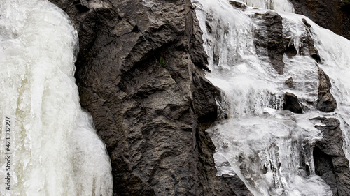 Full frame shot of icicles on a rock wall
