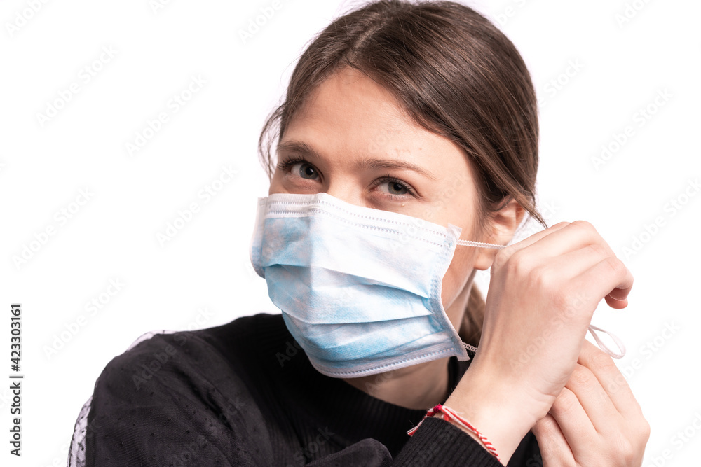 Beautiful young woman posing with mask,