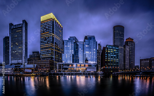 Canvas Print Moody Nightscape of Central Boston Financial District and reflections on the Bos