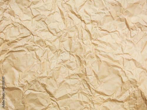 Crumpled brown paper Texture of brown paper that is rough and wrinkled image as background to fill with text or logo in vintage style