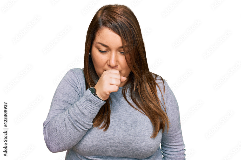 Beautiful brunette plus size woman wearing casual clothes feeling unwell and coughing as symptom for cold or bronchitis. health care concept. Beautiful brunette plus size woman wearing casual clothes feeling unwell and coughing as symptom for cold or bronchitis. health care concept.