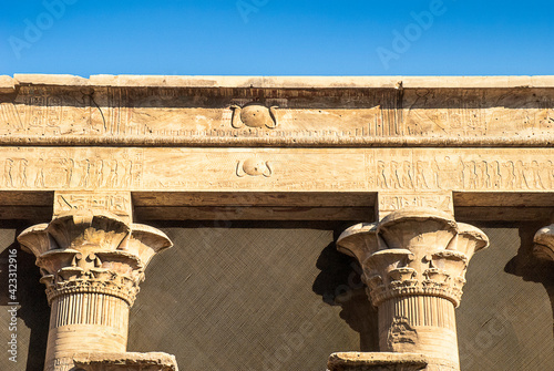 The Temple of Edfu is an ancient Egyptian temple located on the west bank of the Nile. It is the second largest temple in Egypt after Karnak  It is dedicated to the falcon god Horus photo