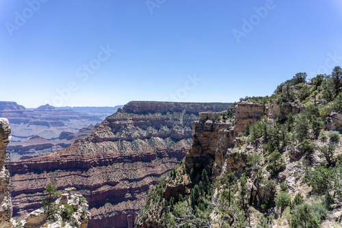 Clear skies and The Grand Canyon. that is a huge valley cut by the Colorado River.