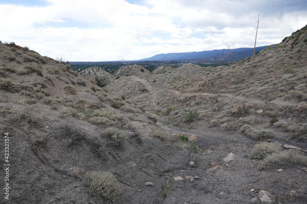 Dry arid climate landscape with scattered scrub vegetation Dry arid climate landscape with scattered scrub vegetation