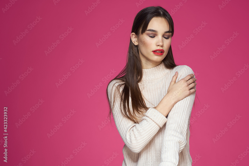 Woman with long hair and red lips white blouse pink background attractive look Woman with long hair and red lips white blouse pink background attractive look