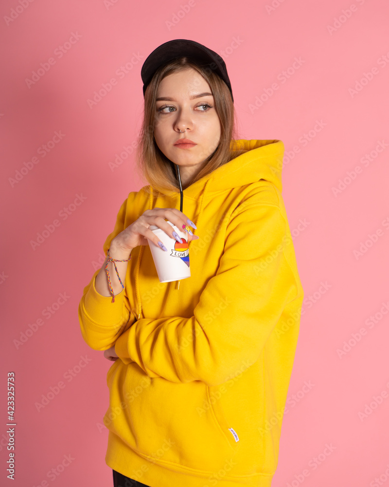 Woman with LGBT rainbow coffee cup Woman with LGBT rainbow coffee cup