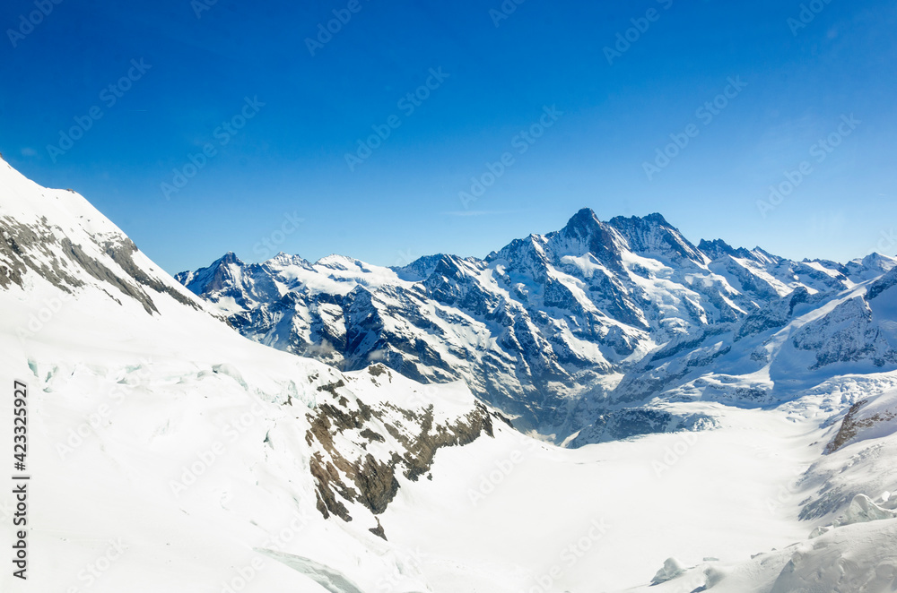 Obraz premium Alps Eiger and Jungfrau dramatic snowy mountain peaks panorama Switzerland.