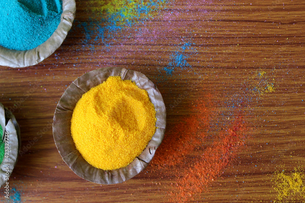 Indian Holi traditional colors in disposal organic bowl, different organic  Gulal color on the occasion of Holi festival, Abstract background,  selective focus with blur. Stock Photo | Adobe Stock