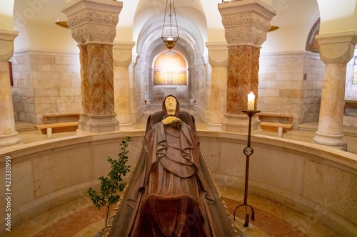 Life-size statue of Mary in death made of cherry wood and ivory inside of Dormition Abbey - church on the site where the Virgin Mary is said to have died.
JERUSALEM, ISRAEL - march 2021