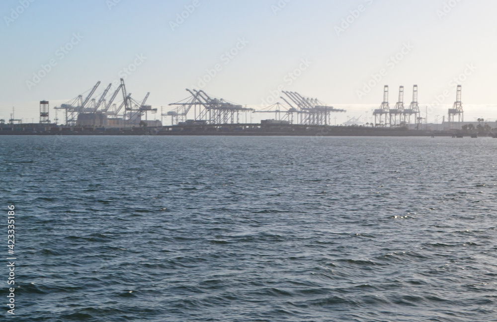 Long Beach shipping and container port with cranes loading cargo, USA Long Beach shipping and container port with cranes loading cargo, USA