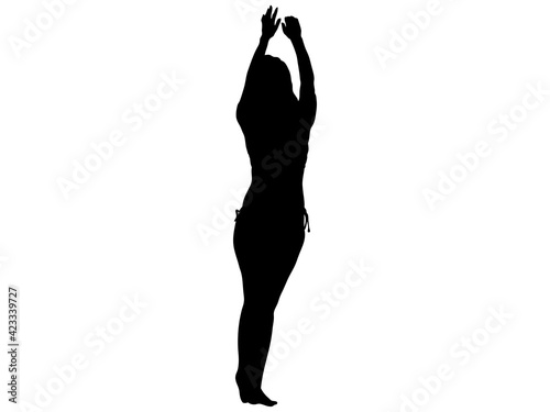 背伸びをする水着姿の女性シルエット