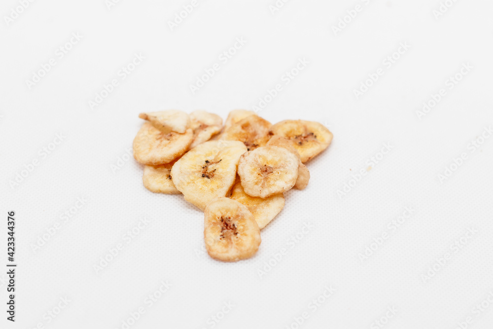 banana chips on white background close up banana chips on white background close up