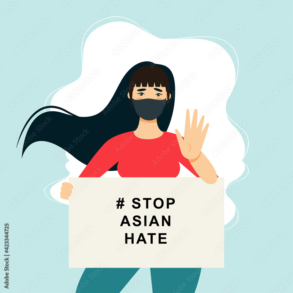 Stop Asian Hate‬‬. Hashtag to support asian community during the covid-19 pandemic. Stop racism. woman wearing protective face mask and holding banner against bullying, hate and violence.