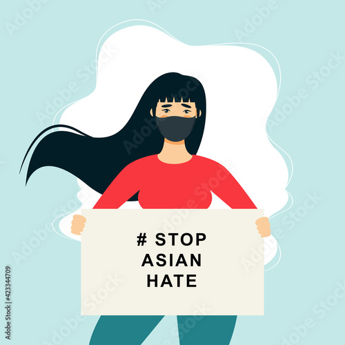 Stop Asian Hate‬‬. Hashtag to support asian community during the covid-19 pandemic. Stop racism. woman wearing protective face mask and holding banner against bullying, hate and violence.