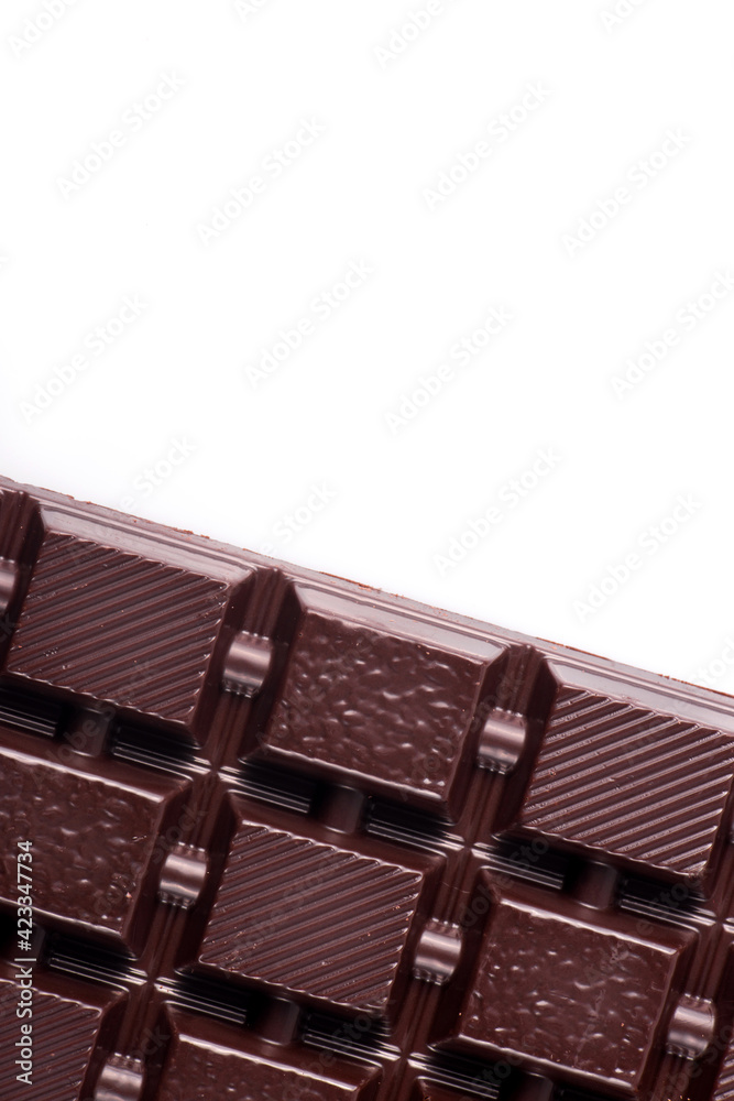 Broken dark chocolate broken stack isolated on white background Broken dark chocolate broken stack isolated on white background