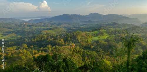 Morning landscape panorama from Golo Curu hill near Ruteng, Manggarai regency, Flores island, East Nusa Tenggara, Indonesia photo