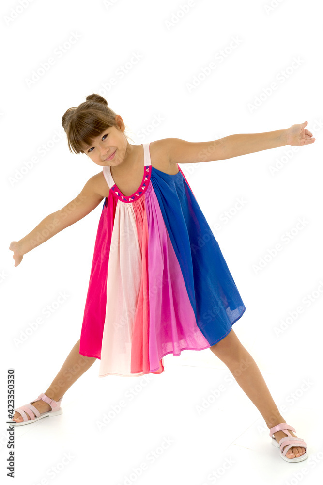 Girl with outstretched arms and legs wide apart