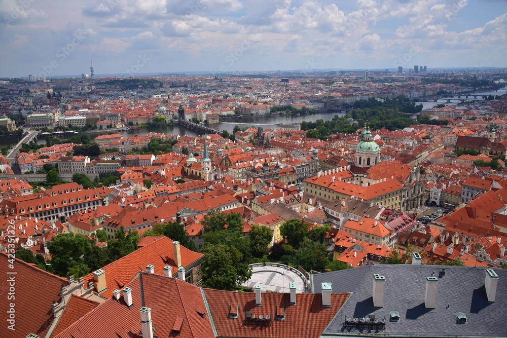 Prague is characteristic with its red rooftops, here shown in summer with blue skies, Central Bohemia, Czech Republic.