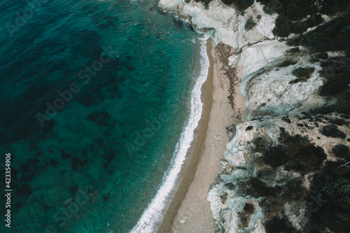 Top view aerial image from drone of an stunning beautiful sea landscape beach with turquoise water. Beautiful Sand beach with turquoise water,aerial drone shot. 'Foca' Izmir Turkey