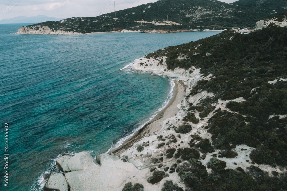 Top view aerial image from drone of an stunning beautiful sea landscape beach with turquoise water. Beautiful Sand beach with turquoise water,aerial drone shot. 'Foca' Izmir Turkey
