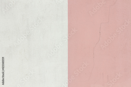 Stone background consisting of pink and white colors. Separation of two colors