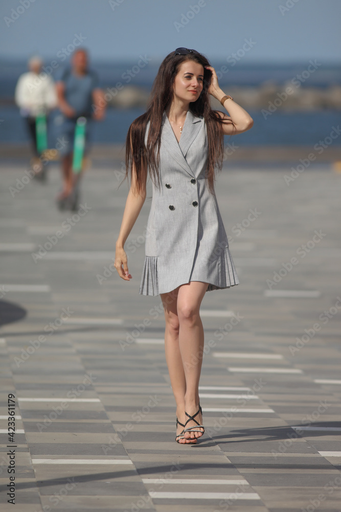 young beautiful woman in dress