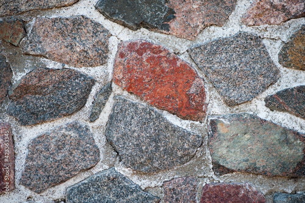 Wall of stones. Dry masonry. folded stone wall. Stone wall as background. concept of construction, architecture, renovation. Part of a stone wall pattern for background, texture or text. close-up Wall of stones. Dry masonry. folded stone wall. Stone wall as background. concept of construction, architecture, renovation. Part of a stone wall pattern for background, texture or text. close-up