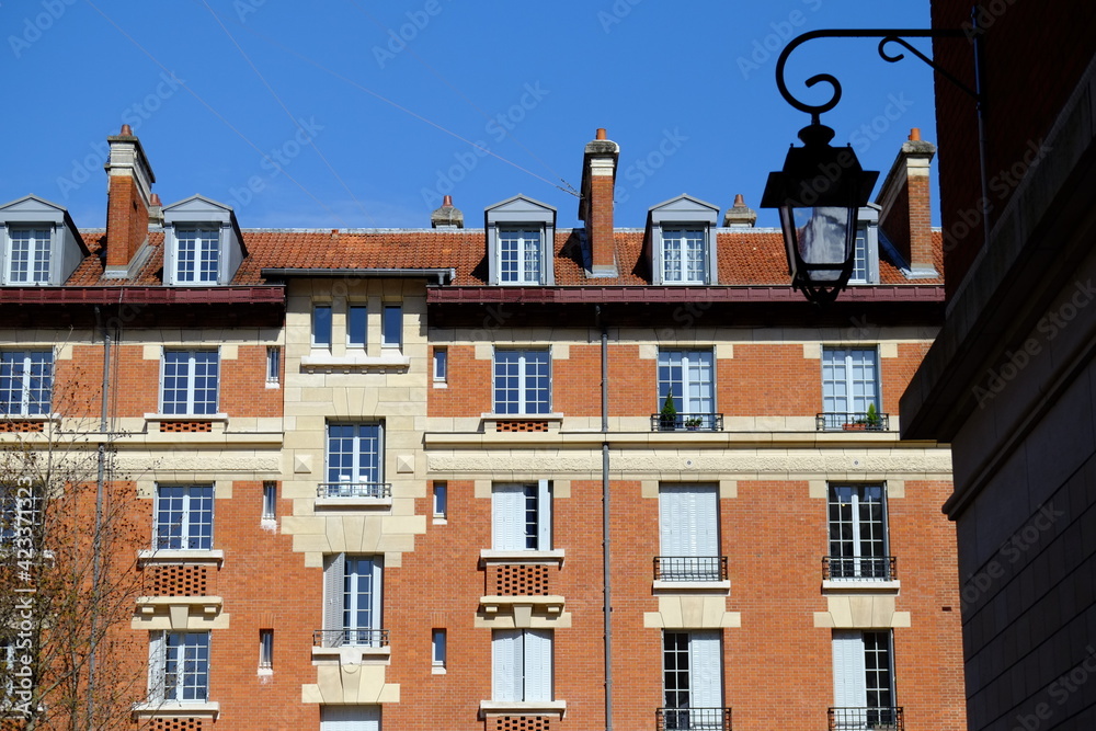 Obraz premium The facade of the Marais an historical quarter in Paris center. Spring 2021, Paris, France.