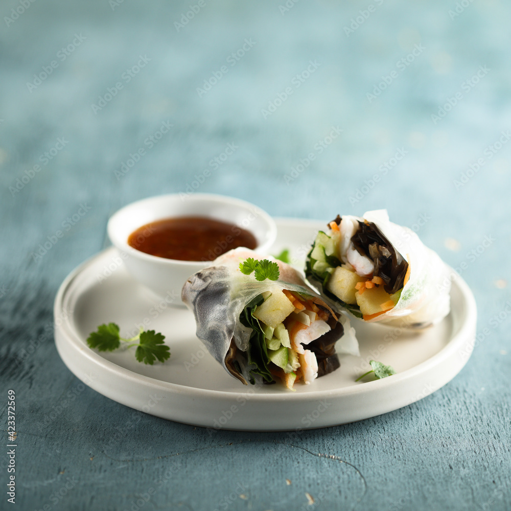 Traditional homemade fresh rolls with mango and crab Traditional homemade fresh rolls with mango and crab
