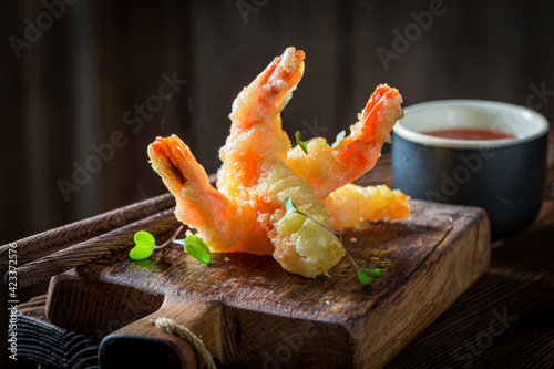 Closeup of shrimp in tempura with sauce. Chinese cuisine.